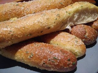 Warm and fluffy breadsticks, made by yours truly